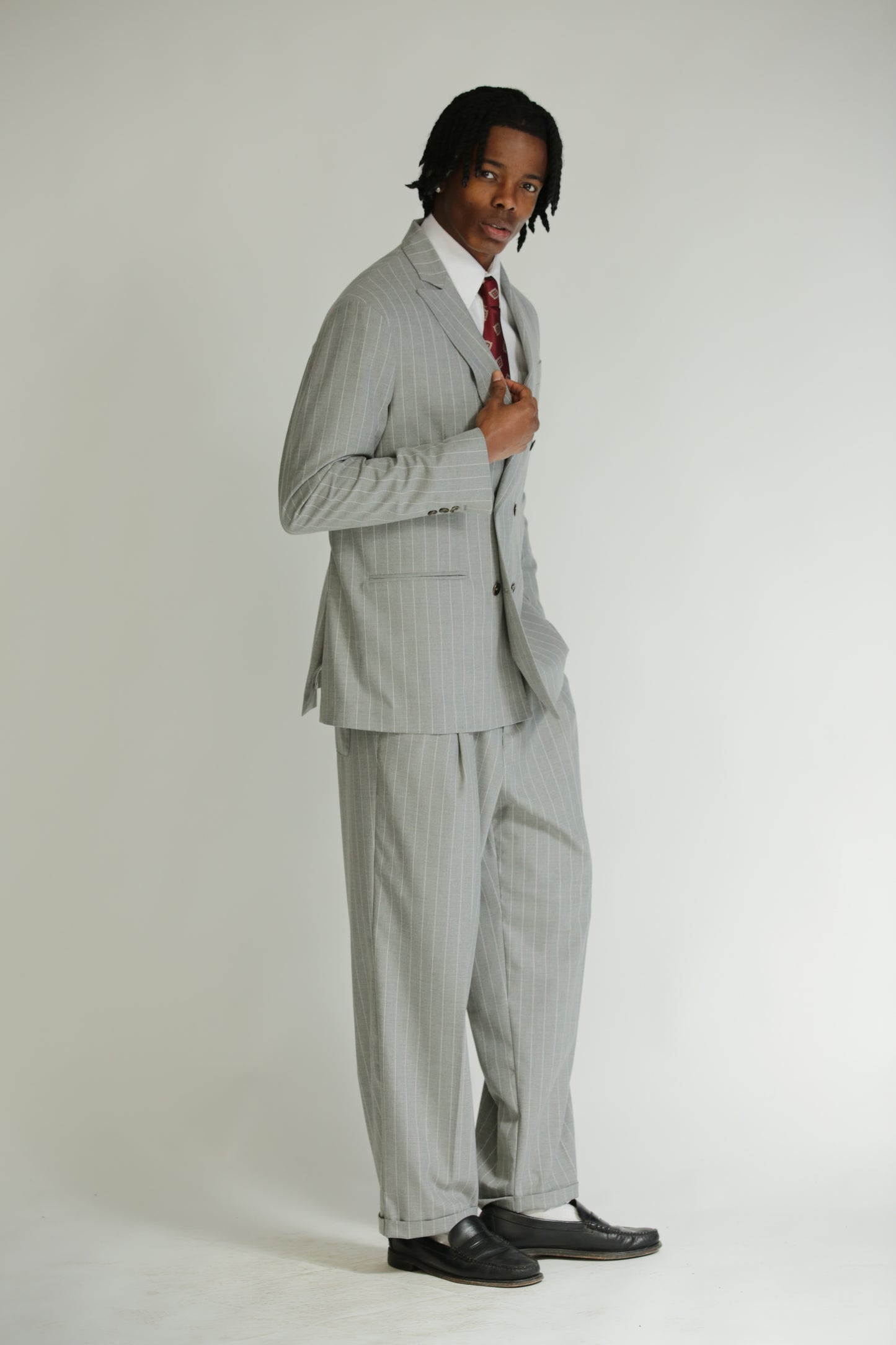 Pantalone vita alta fondo largo gessato grigio