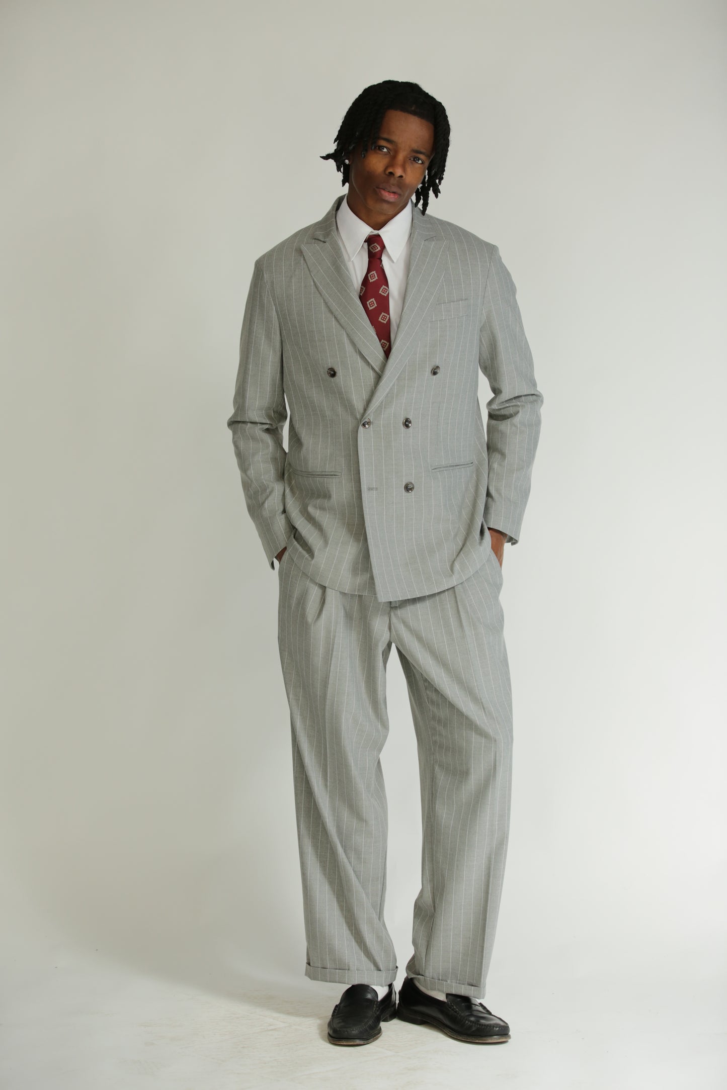 Pantalone vita alta fondo largo gessato grigio