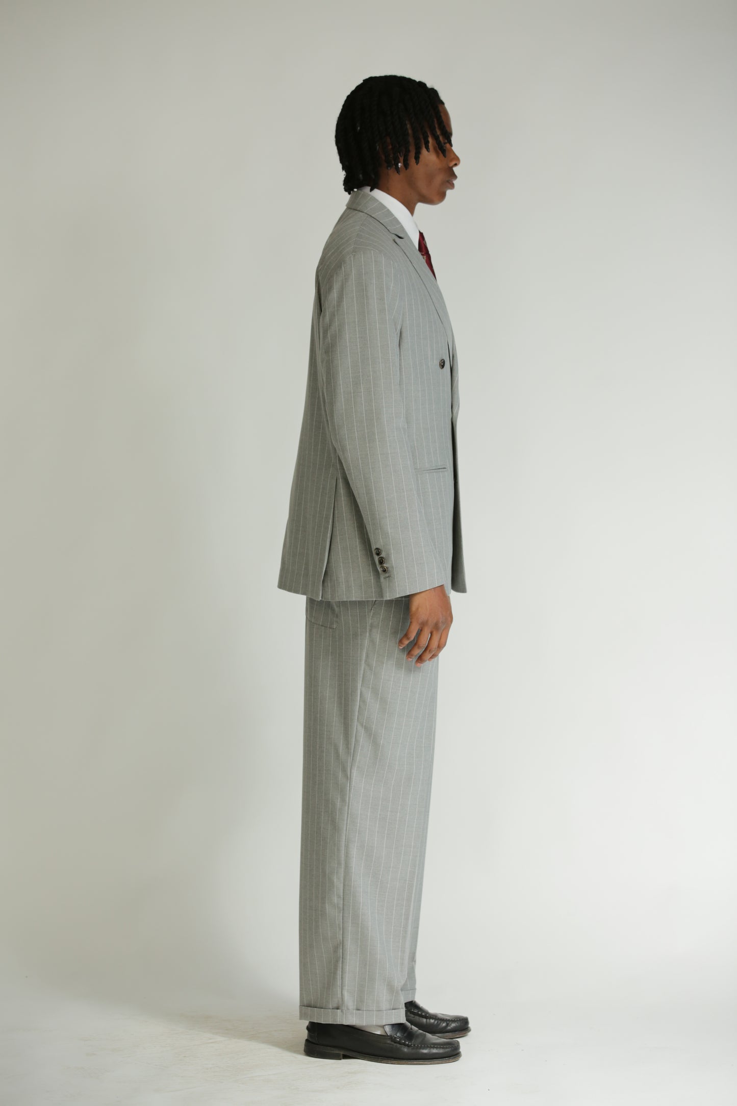 Pantalone vita alta fondo largo gessato grigio