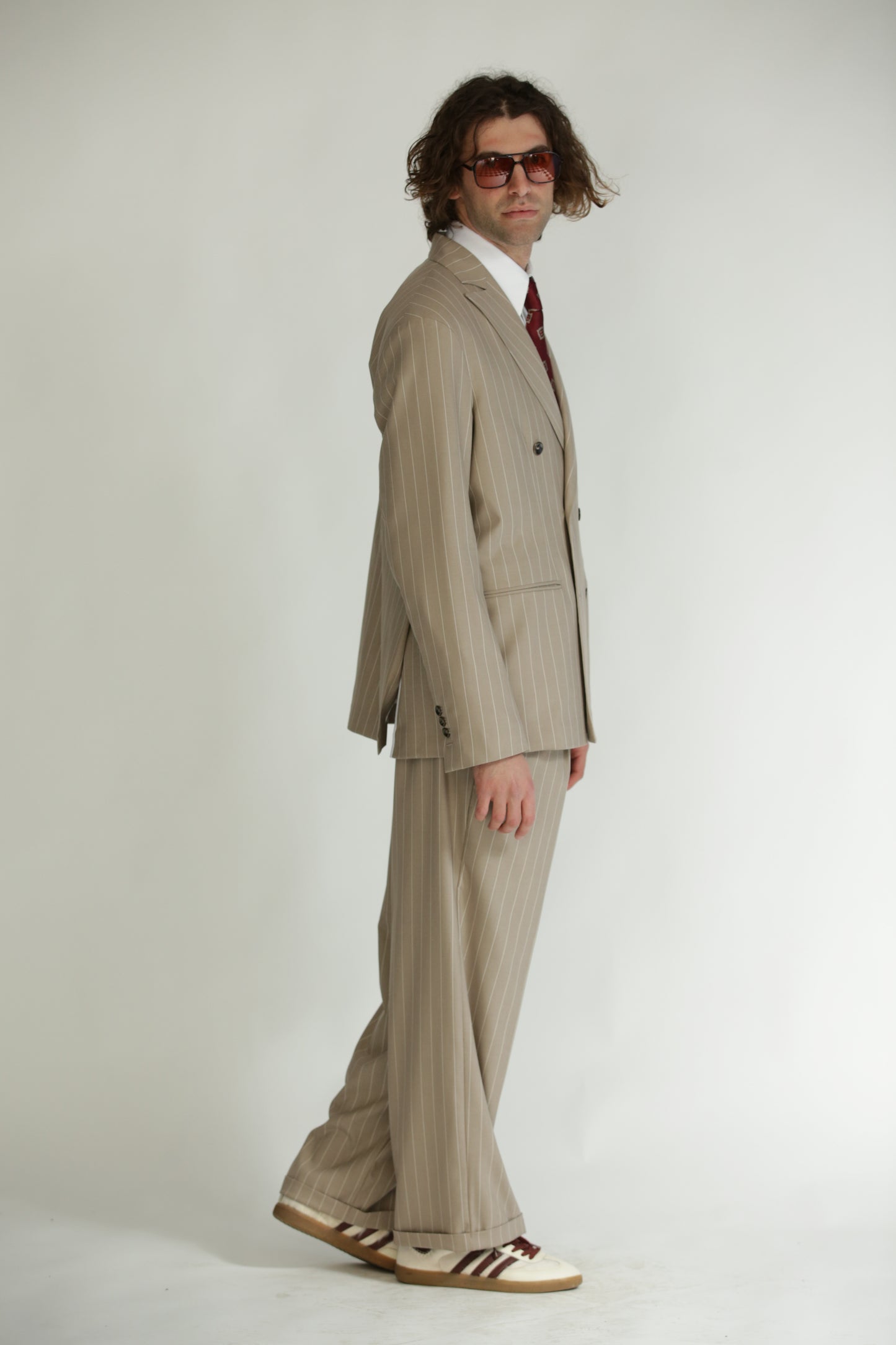Pantalone vita alta fondo largo gessato beige