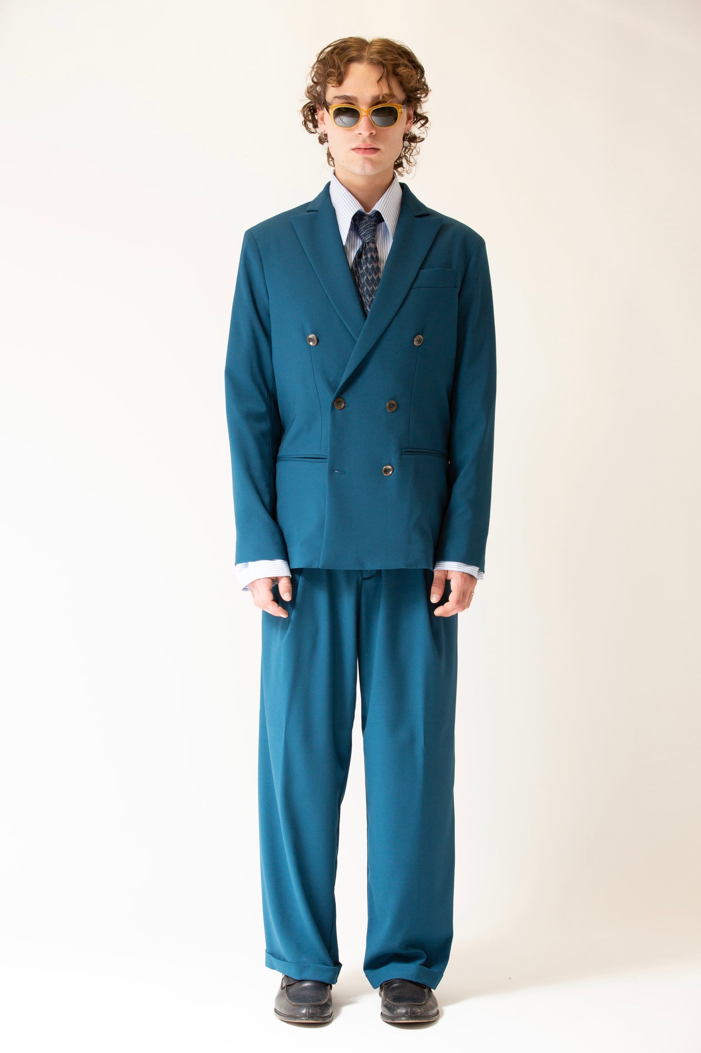 Pantalone vita alta fondo largo ottanio uomo