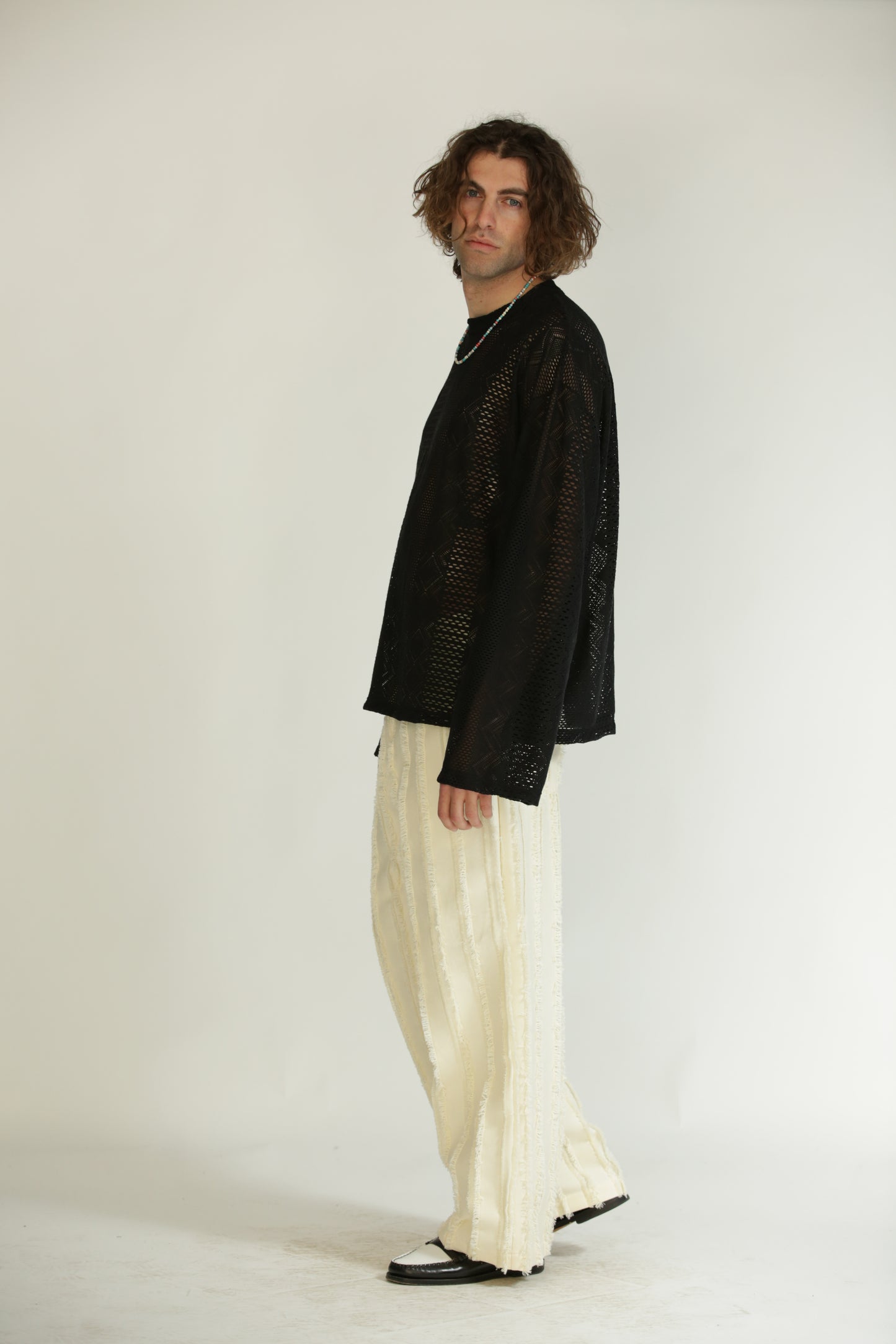 Pantaloni frangiati panna