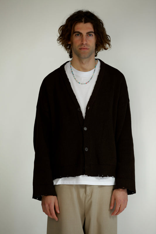 Cardigan nero taglio vivo