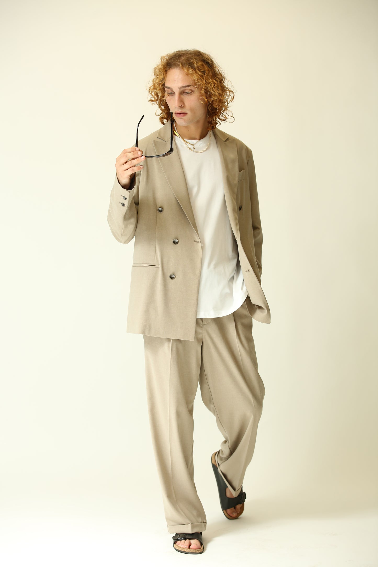 Pantalone vita alta fondo largo beige