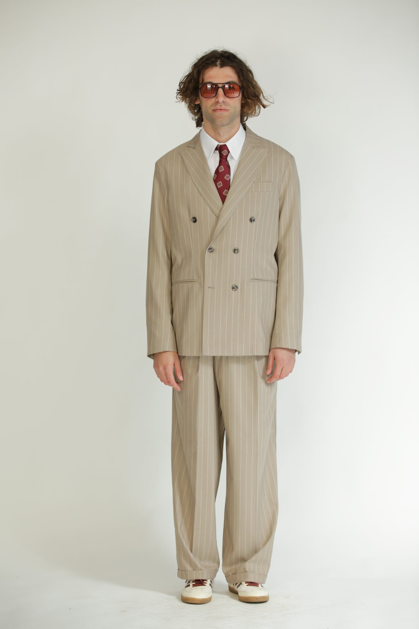 Pantalone vita alta fondo largo gessato beige