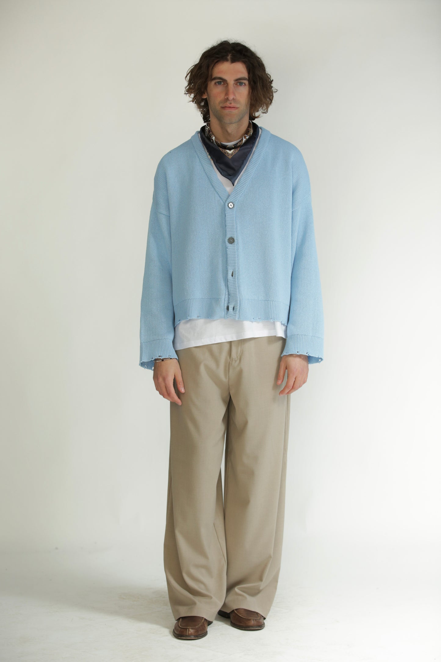 Cardigan crop taglio vivo celeste