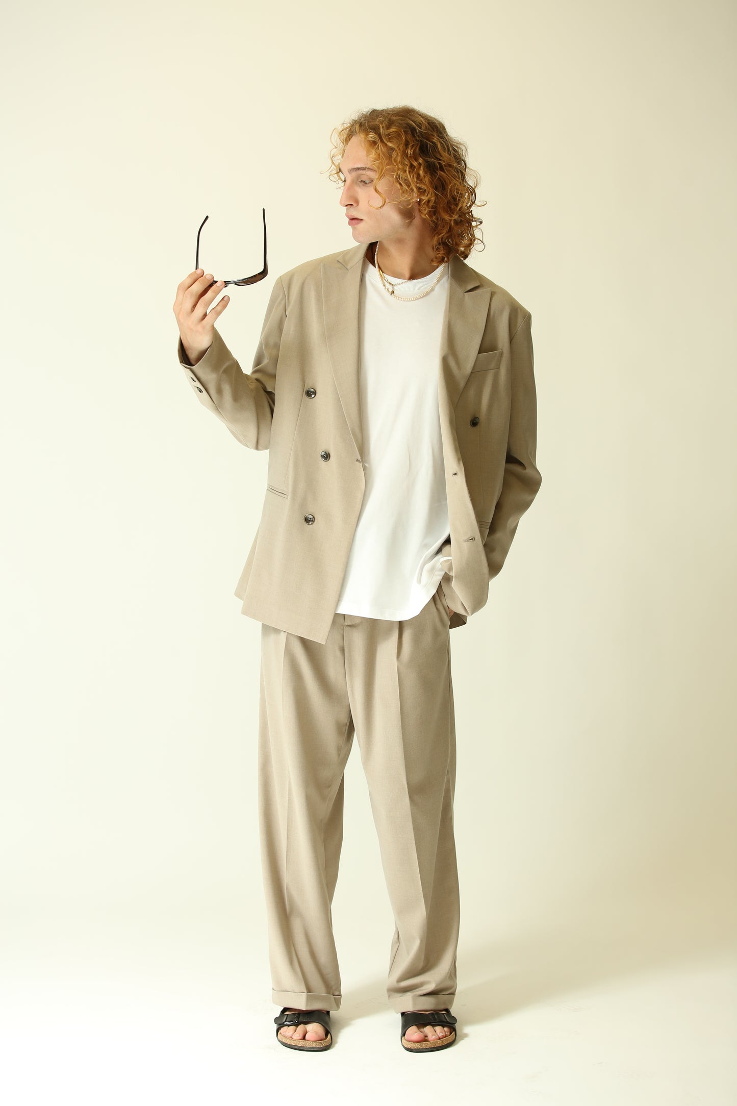 Pantalone vita alta fondo largo beige
