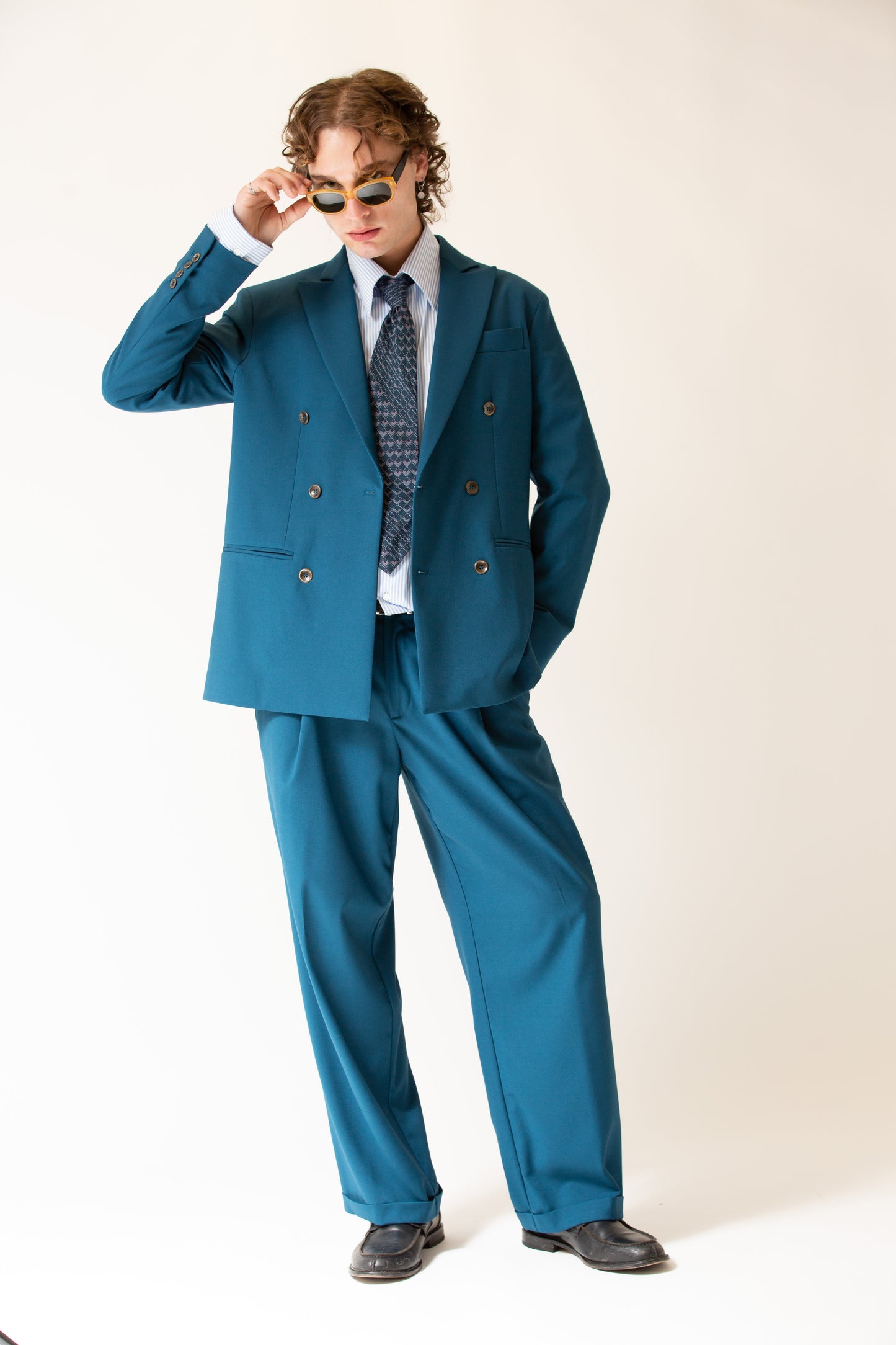 Pantalone vita alta fondo largo ottanio uomo