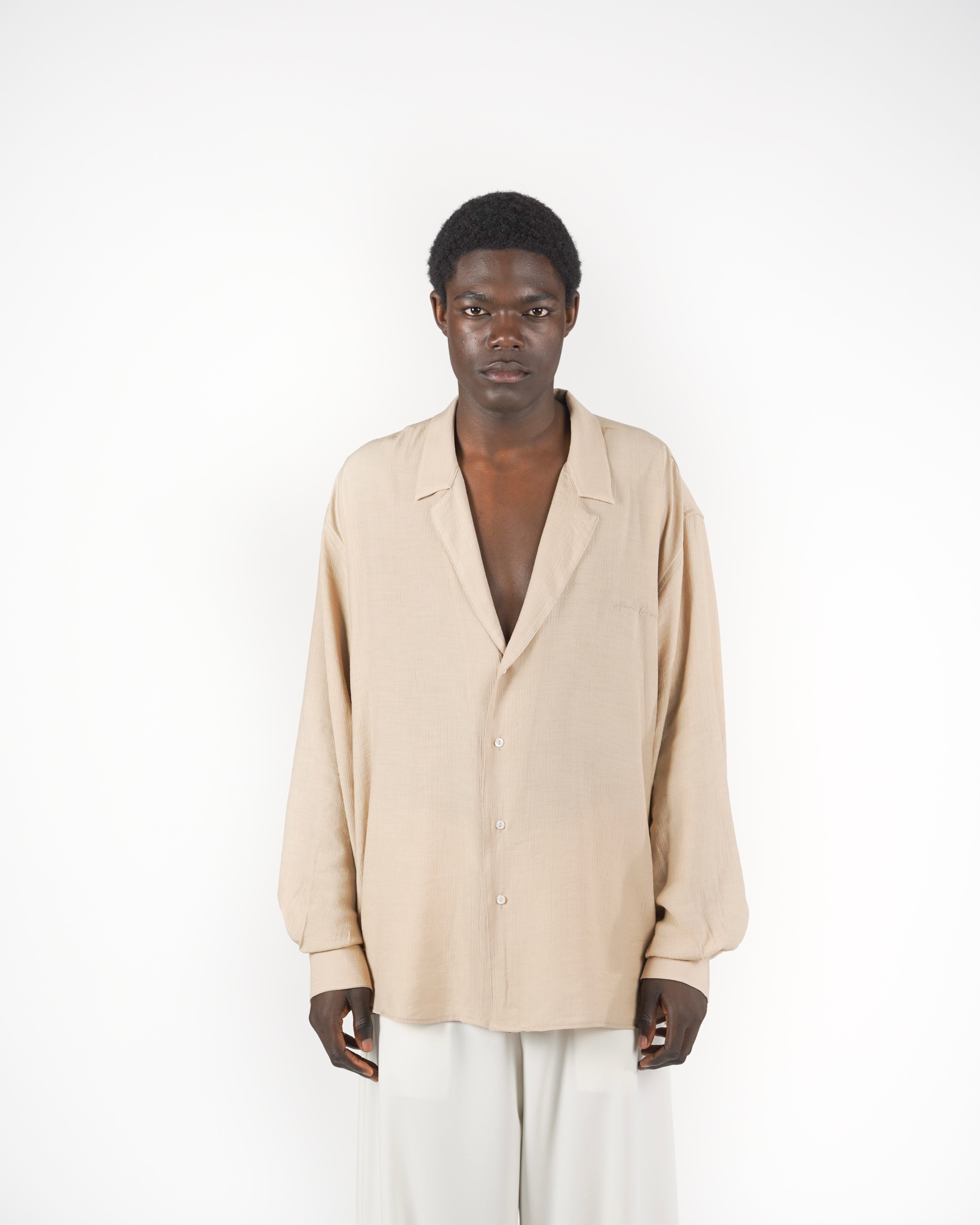 Camicia scollata beige
