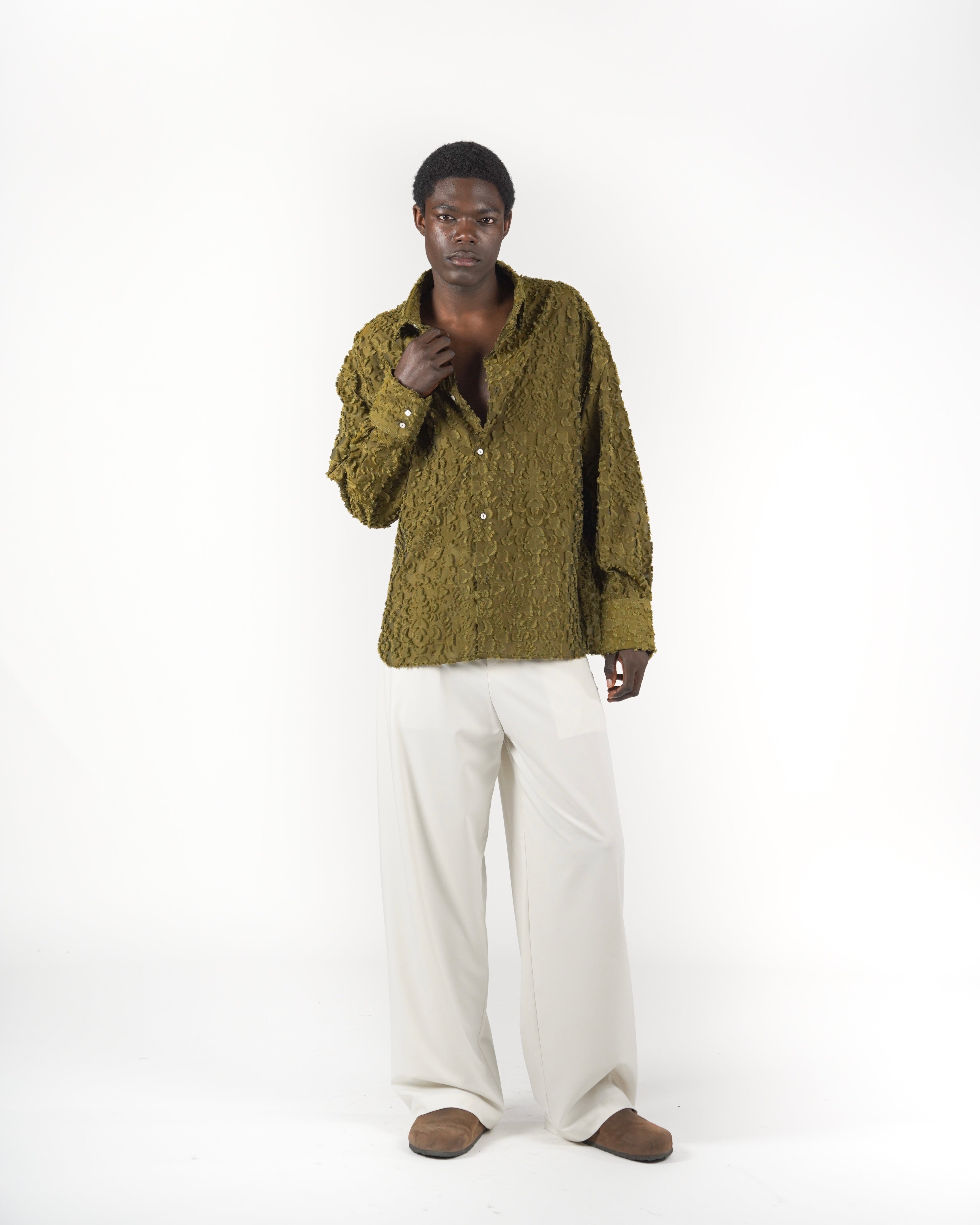 Camicia verde frangiata