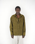 Camicia verde frangiata