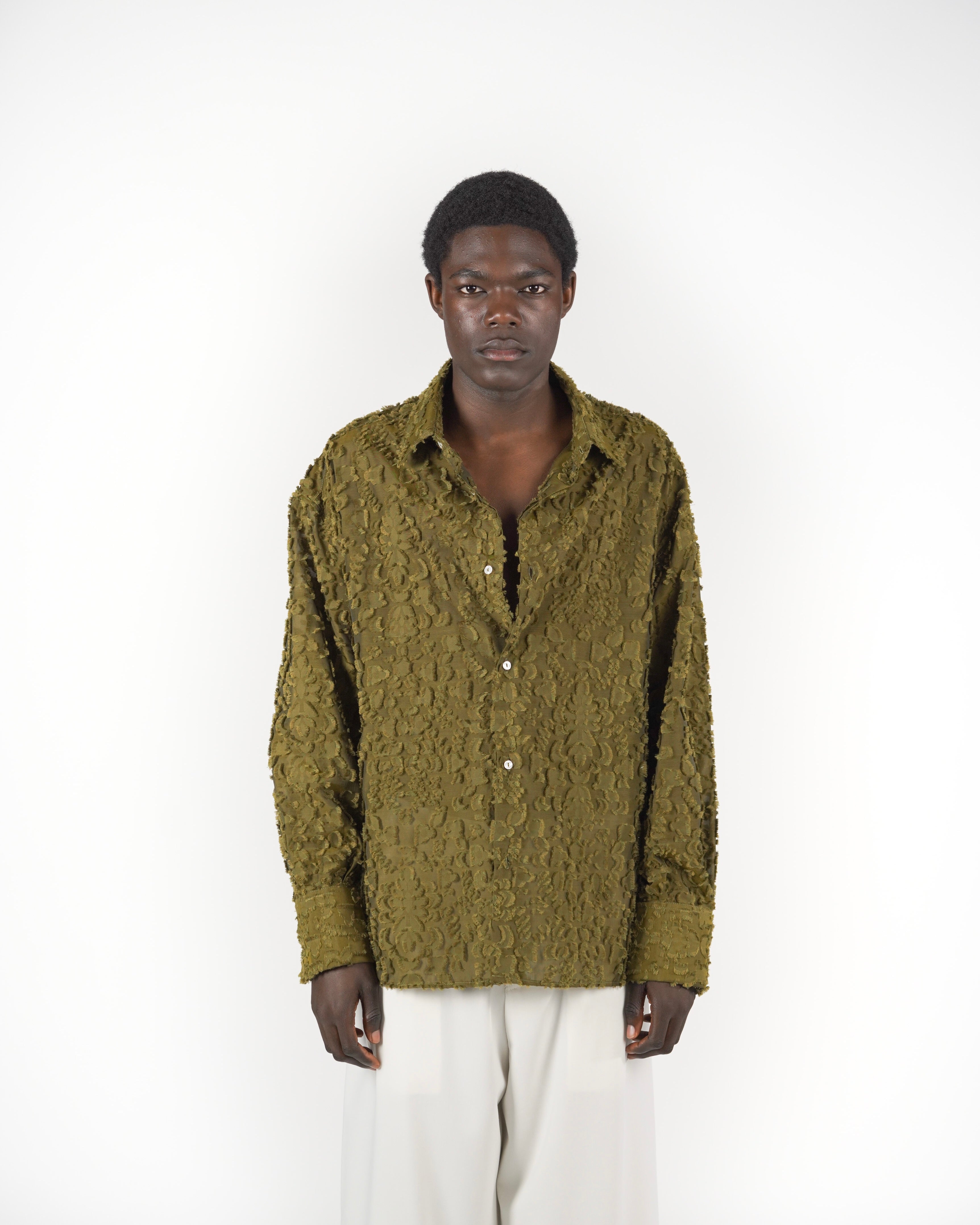 Camicia verde frangiata