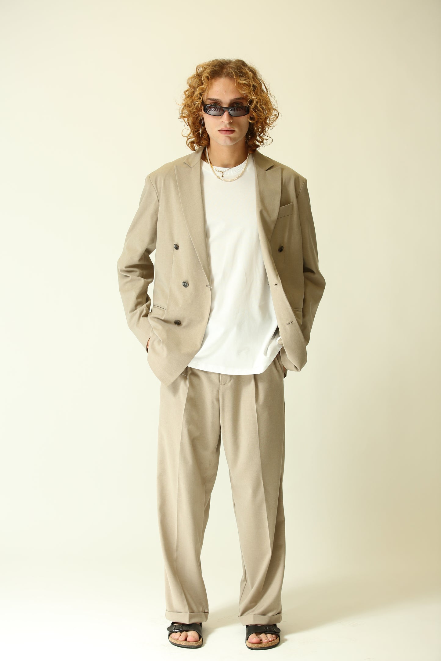 Pantalone vita alta fondo largo beige